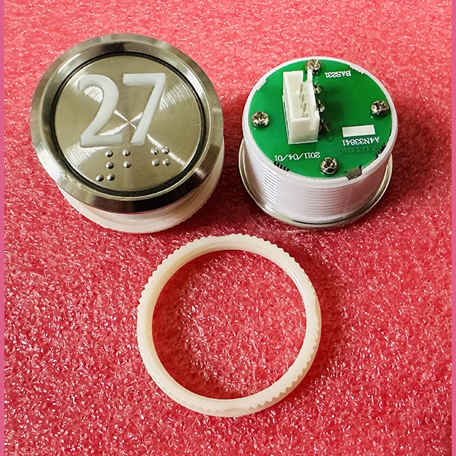 Кнопка "27" (с шрифтом Брайля, белая круговая подсветка, тип BAS231) A4N33841 Otis