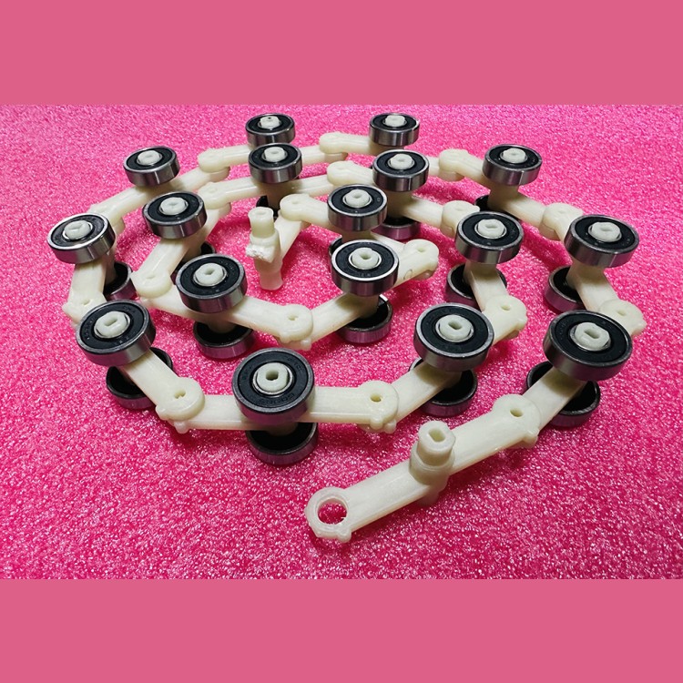 Цепь огибающая балюстрады поручня эскалатора L-1130мм P-60мм 17 пар роликов Otis