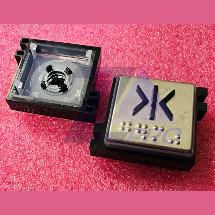 Толкатель кнопки с выдавленной надписью ">I<" шрифт Брайля Schindler