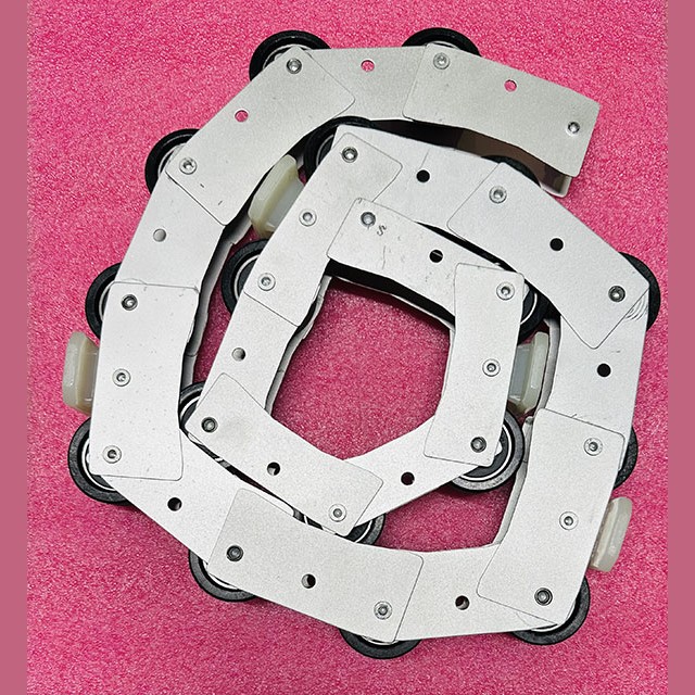 Отклоняющая цепь балюстрады эскалатора на 16 роликов D-46mm H-18mm XAA332AB6 XIZI OTIS