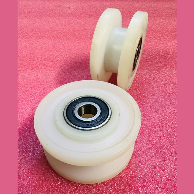 Ролик направляющий верхний поручня эскалатора (2 подшипника 6201-2RS) GAA456DJ1 Otis